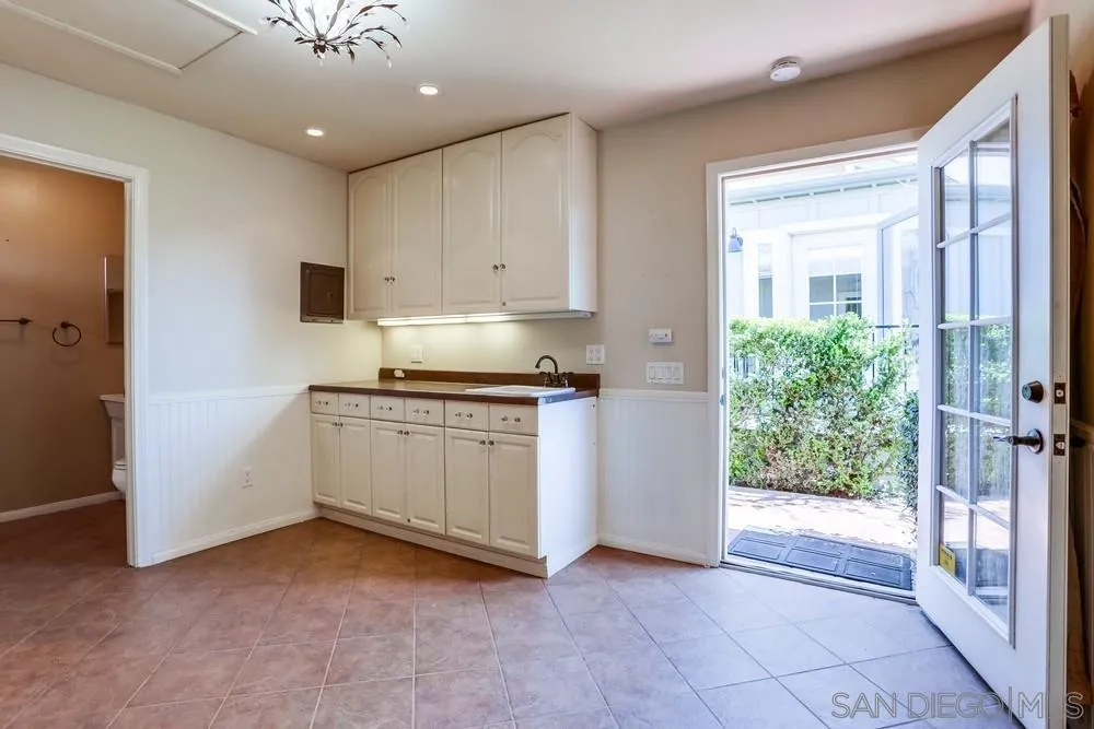 745 Main Street Ramona, CA 92065 - Photo 30 of 40 a view of kitchen with a sink cabinets and window