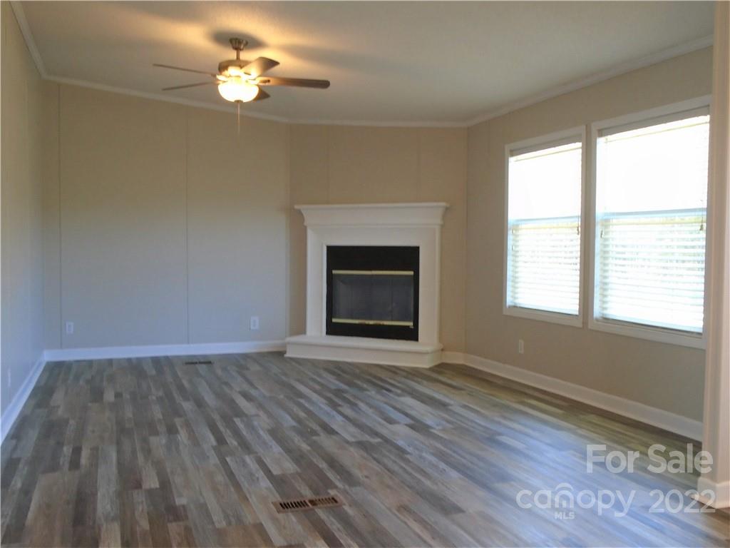 4730 Stagecoach Road Catawba, NC 28609 - Photo 15 of 37 wooden floor chandelier and window in an empty room