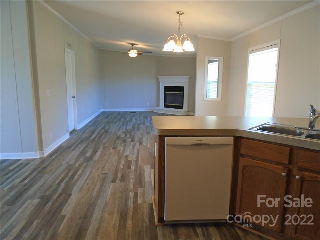 4730 Stagecoach Road Catawba, NC 28609 - Photo 16 of 37 a kitchen with a sink and a mirror