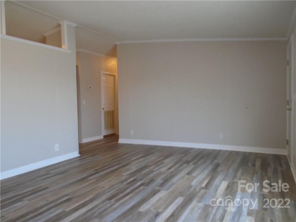 4730 Stagecoach Road Catawba, NC 28609 - Photo 19 of 37 a view of an empty room with wooden floor