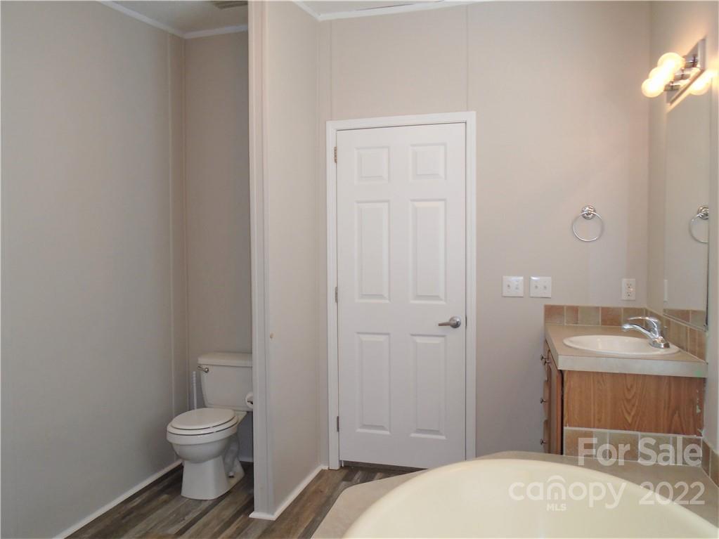4730 Stagecoach Road Catawba, NC 28609 - Photo 26 of 37 a bathroom with a sink toilet and vanity