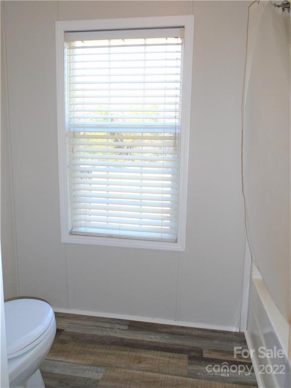 4730 Stagecoach Road Catawba, NC 28609 - Photo 31 of 37 a bathroom with a toilet and a window