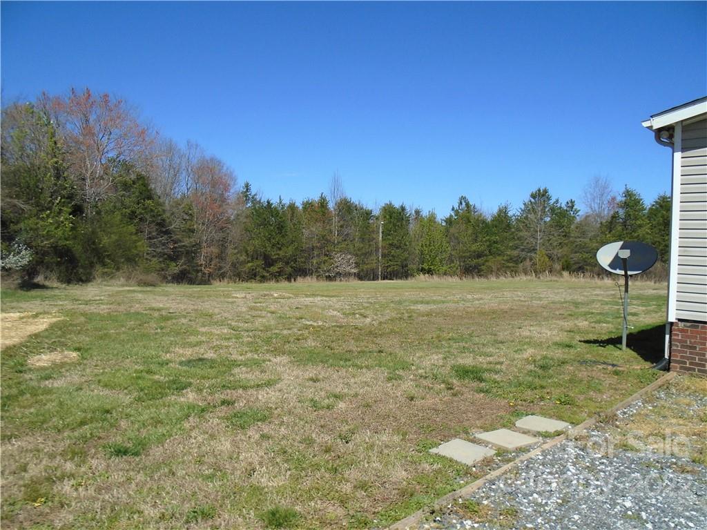 4730 Stagecoach Road Catawba, NC 28609 - Photo 6 of 37 a view of a field of grass and trees