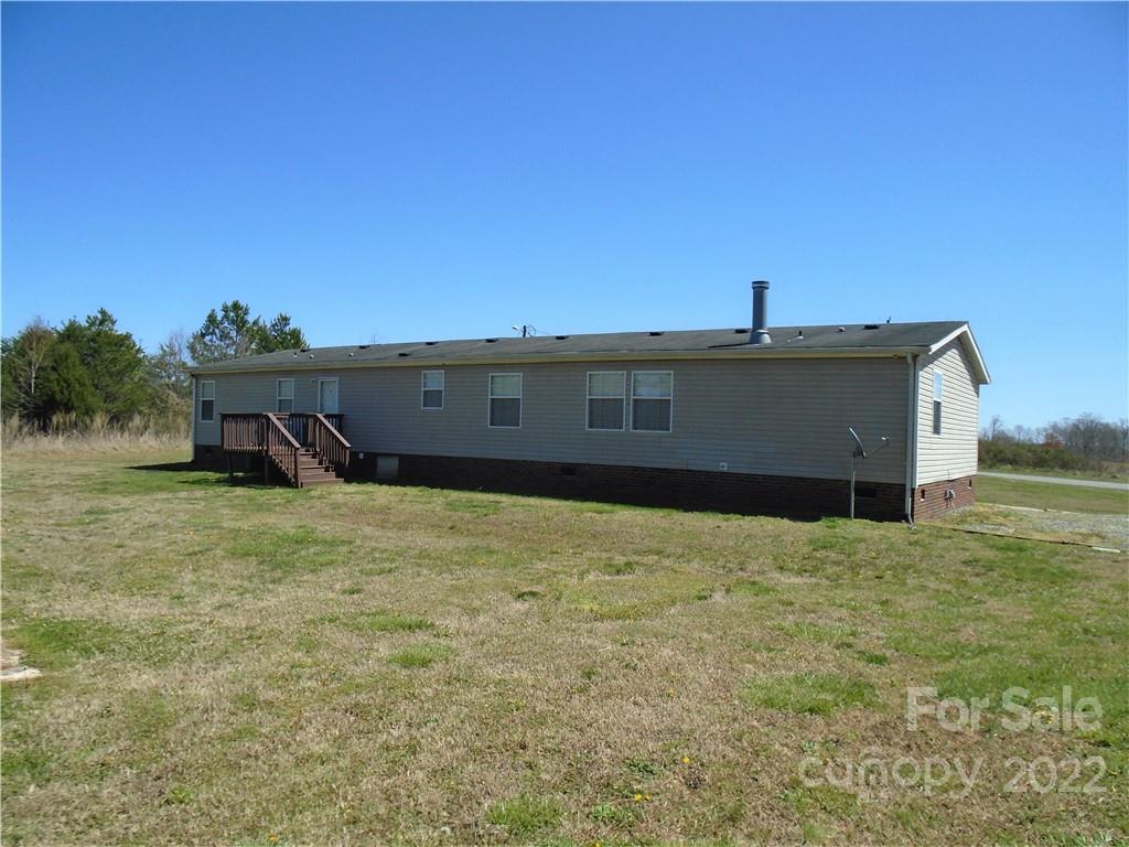 4730 Stagecoach Road Catawba, NC 28609 - Photo 8 of 37 a view of a large house with a big yard