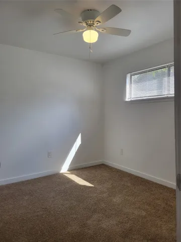 a bathroom with a toilet a sink and bathtub