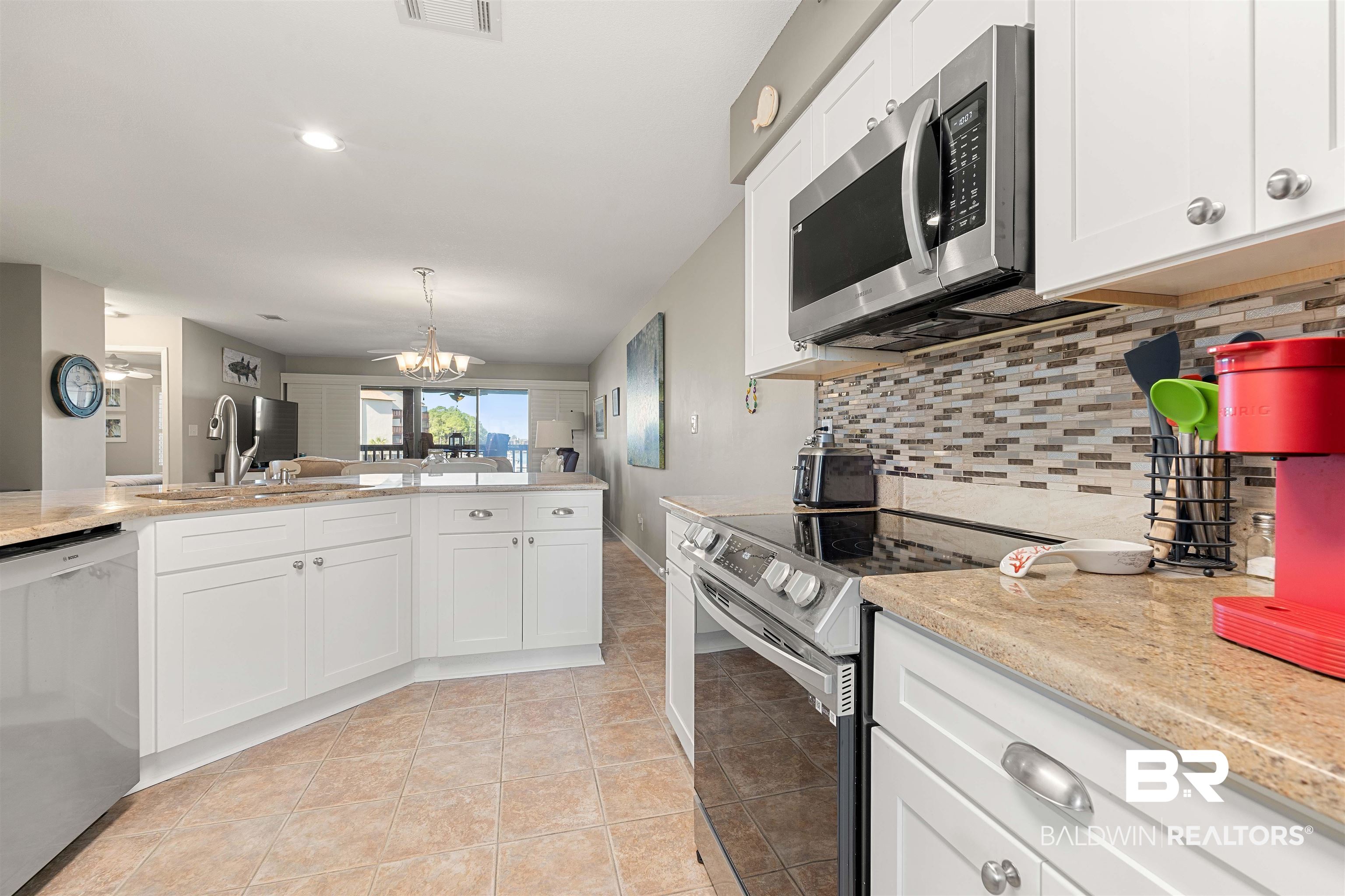 4723 Port Side Lane, Unit 101 Gulf Shores, AL 36542 - Photo 13 of 48 Granite & Backsplash