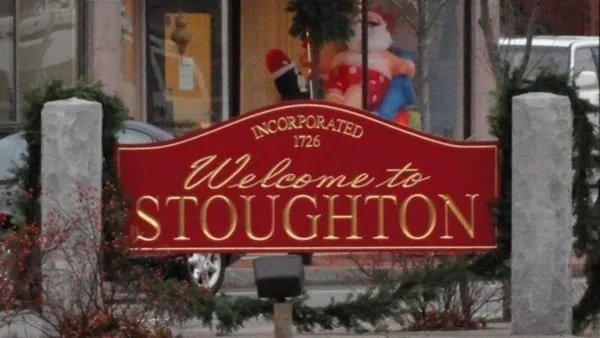 a front view of a building with street