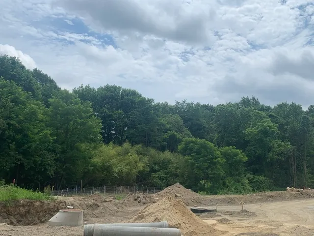 a view of a wooden fence of a house