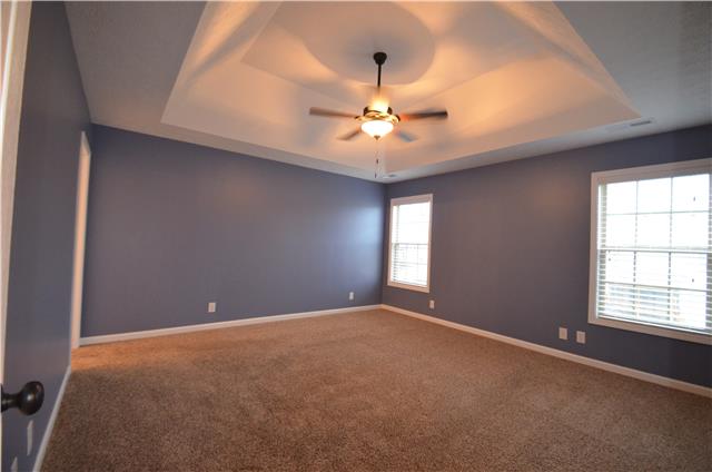 3749 Suiter Road Clarksville, TN 37040 - Photo 11 of 20 BEAUTIFUL MASTER BEDROOM WITH TRAY CEILING, LARGE WALK IN CLOSET, AND VERY SPACIOUS MASTER BATH SUITE WITH LARGE GARDEN TUB AND SEPARATE SHOWER. PRIVACY ALCOVE FOR TOILET. LARGE WALK IN CLOSET AND EXTRA ATTIC STORAGE!!