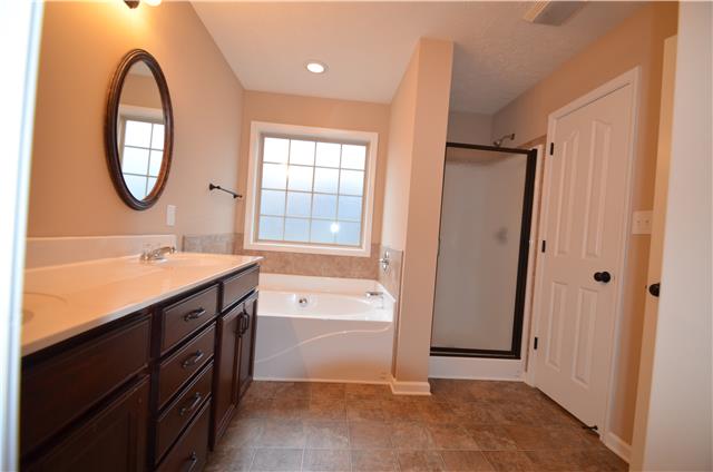 3749 Suiter Road Clarksville, TN 37040 - Photo 12 of 20 VERY SPACIOUS MASTER BATH SUITE WITH LARGE GARDEN TUB AND SEPARATE SHOWER. PRIVACY ALCOVE FOR TOILET. LARGE WALK IN CLOSET