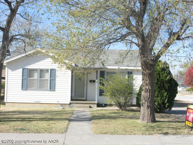 4200 South Jackson Street Amarillo, TX 79110 - Photo 1 of 8 a view of a house with a tree in front