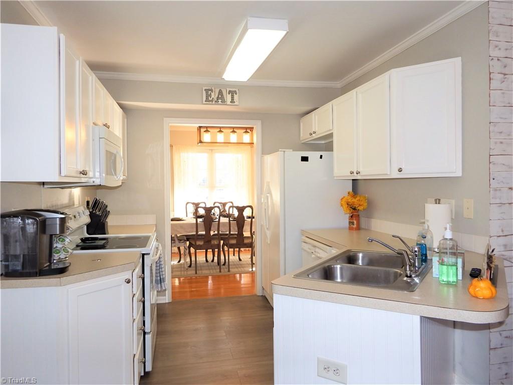 1730 Spring Path Trail Clemmons, NC 27012 - Photo 8 of 21 Kitchen with Angled Island and Eat In Breakfast Room