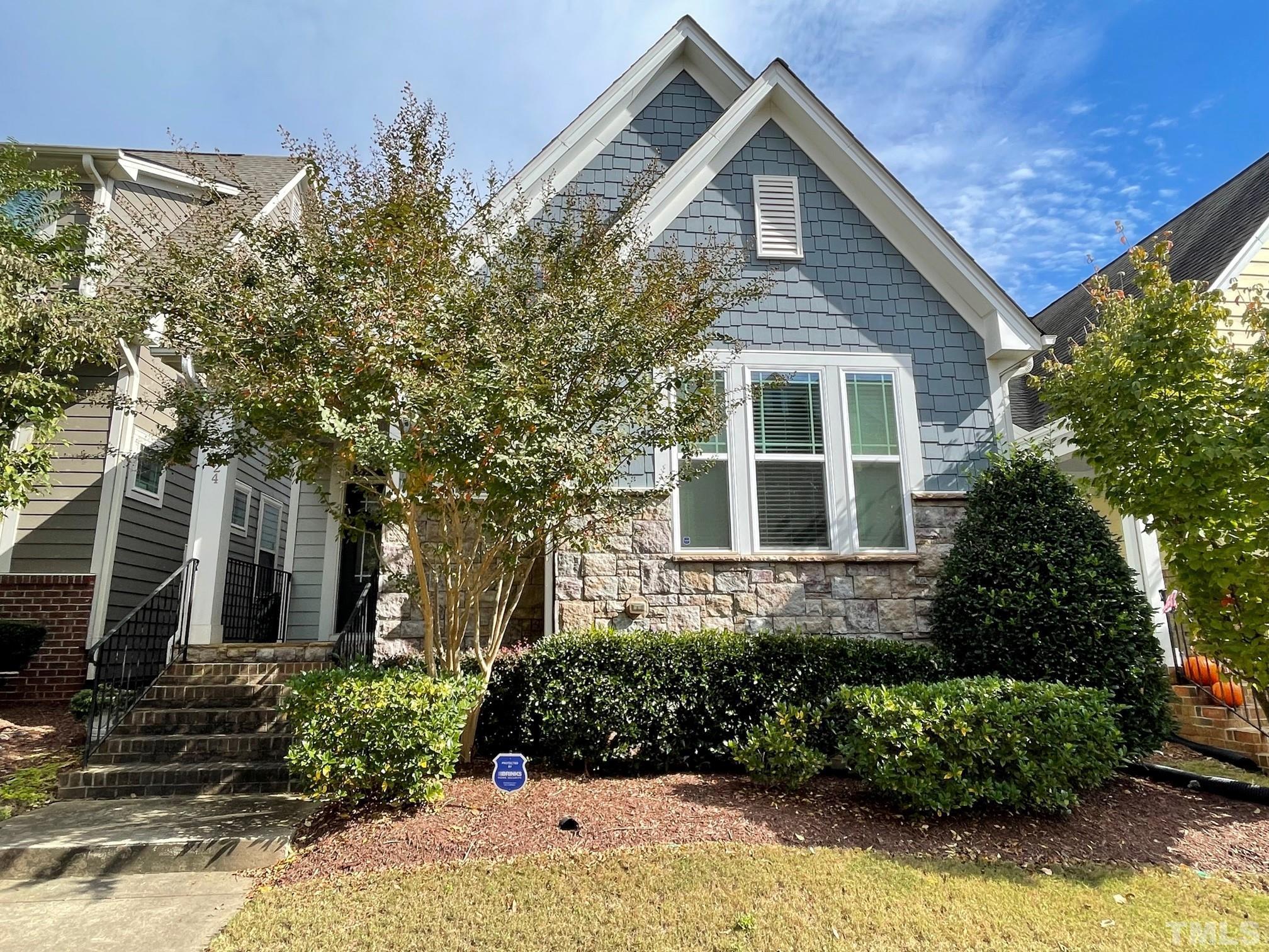 1524 Rodessa Run Raleigh, NC 27607 - Photo 2 of 25 a front view of a house with a yard
