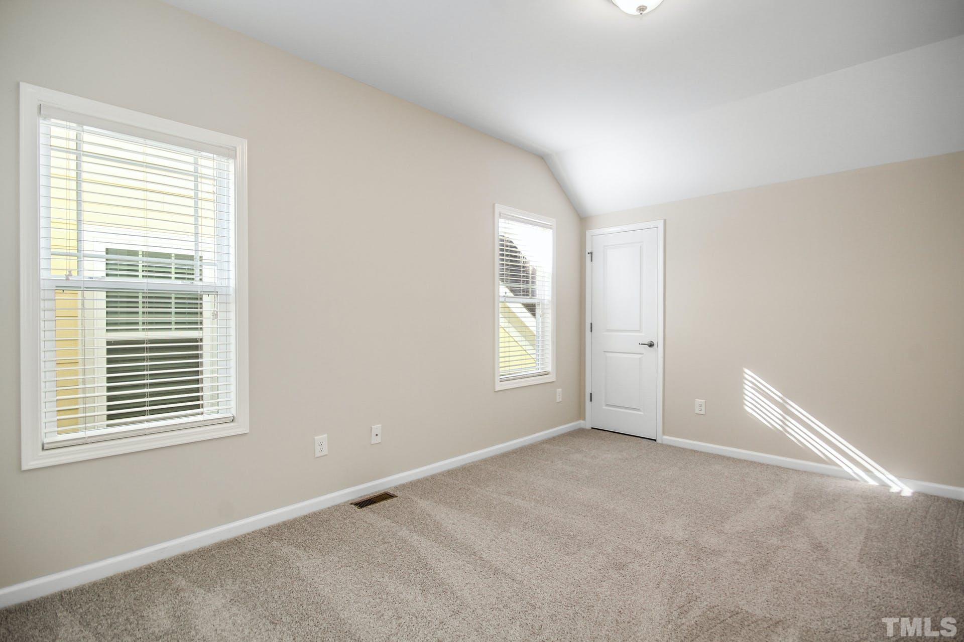1524 Rodessa Run Raleigh, NC 27607 - Photo 18 of 25 a view of an empty room with a window
