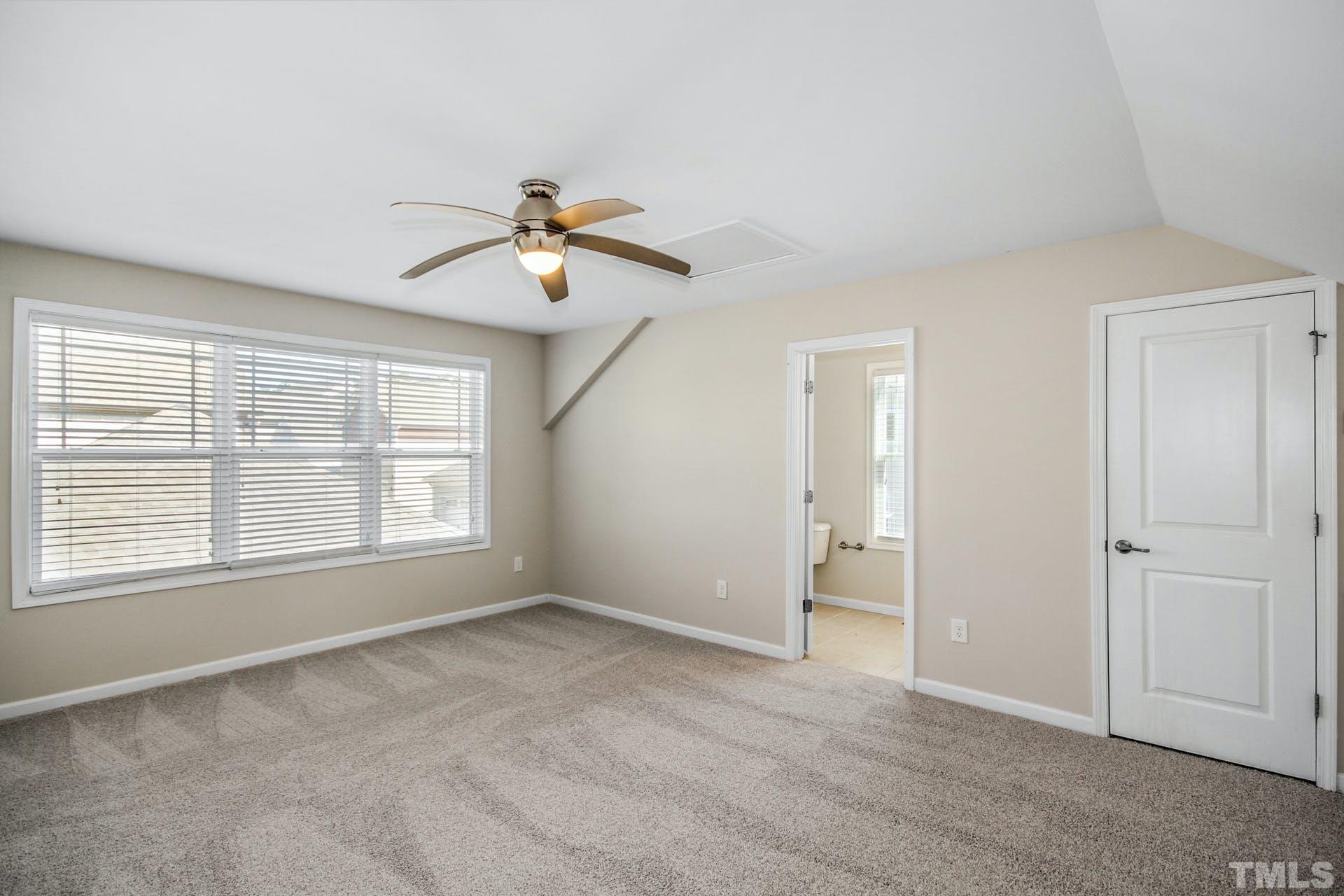 1524 Rodessa Run Raleigh, NC 27607 - Photo 20 of 25 a view of an empty room with a window