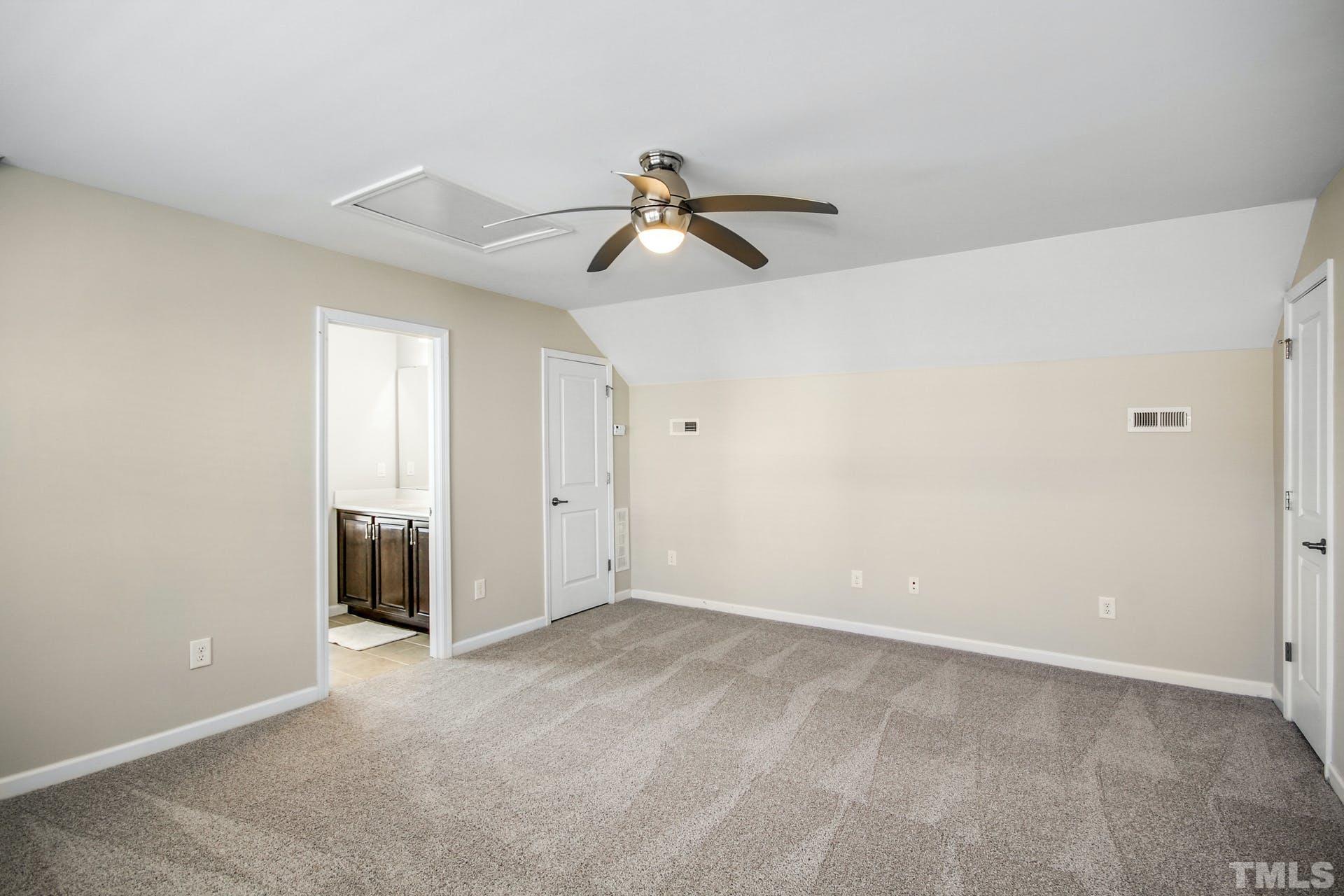 1524 Rodessa Run Raleigh, NC 27607 - Photo 21 of 25 a view of a chandelier fan in a room