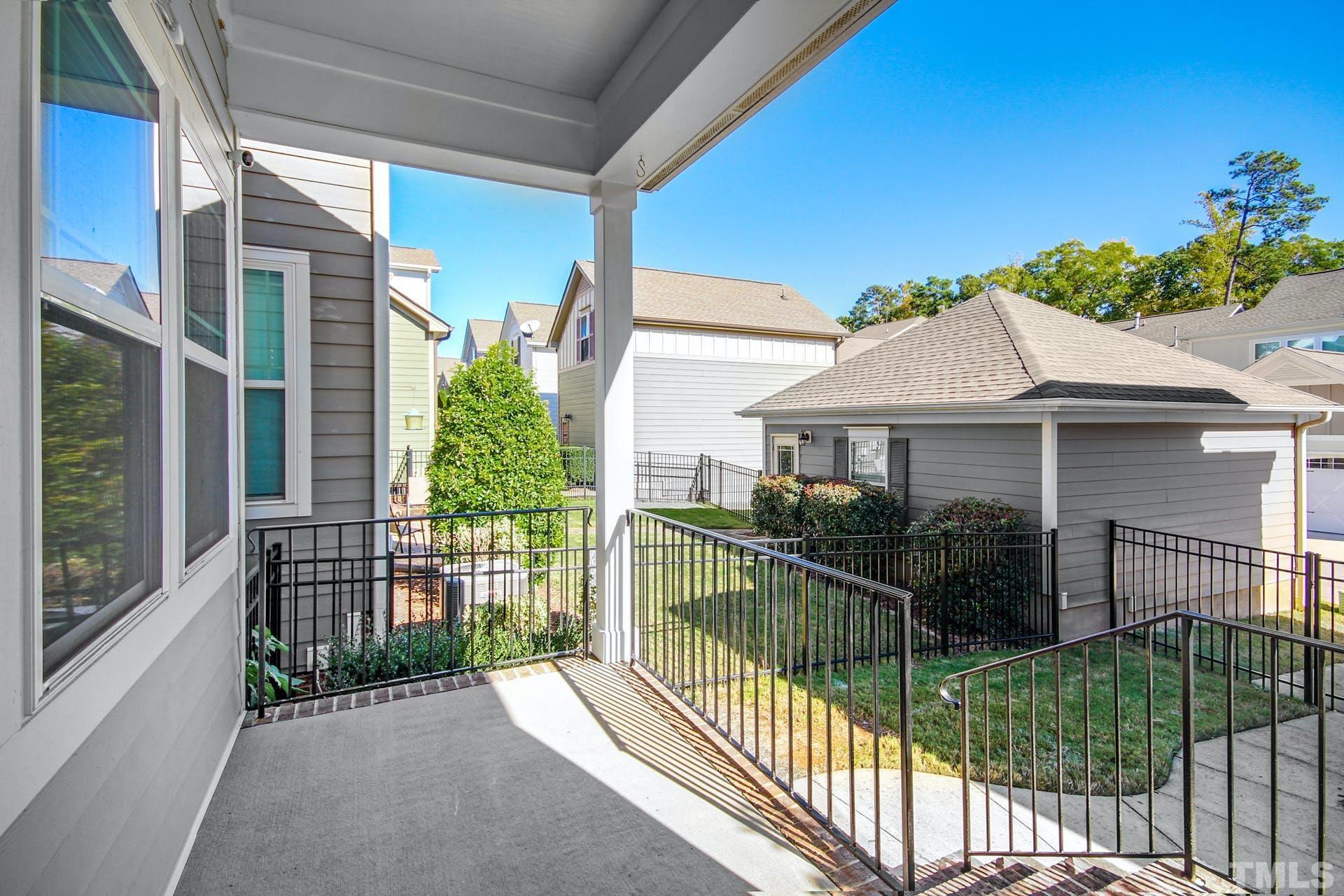 1524 Rodessa Run Raleigh, NC 27607 - Photo 23 of 25 a view of a house with a small yard and plants