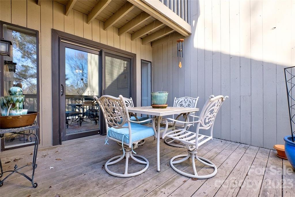 83 Ridgeport Road Lake Wylie, SC 29710 - Photo 13 of 48 a view of a patio with table and chairs and potted plants