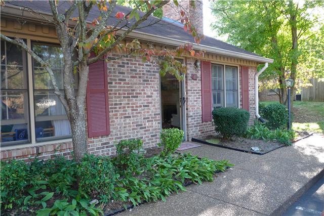 705 Kent Road, Unit 705 Nashville, TN 37214 - Photo 3 of 6 a front view of a house with garden