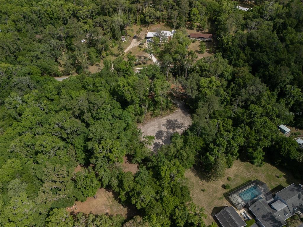983 Southwest 25th Place Gainesville, FL 32608 - Photo 12 of 13 an aerial view of a house with a yard