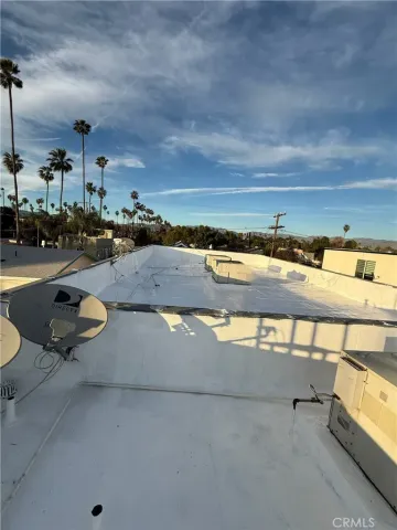 a view of swimming pool with furniture