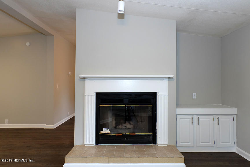 13433 Grover Road Jacksonville, FL 32226 - Photo 17 of 36 Wood Burning Fireplace