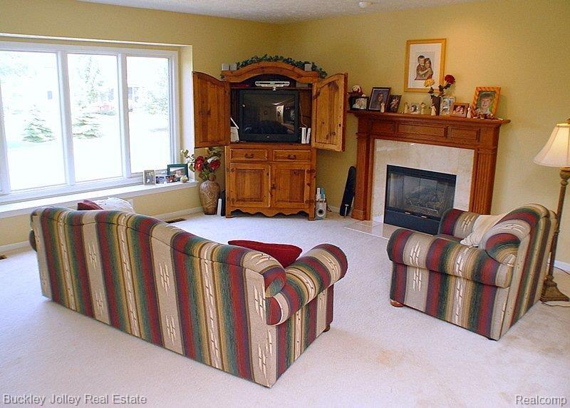 8467 Lee Road Brighton, MI 48116 - Photo 5 of 8 Family Room with Fireplace