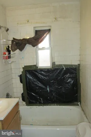 a view of a entryway with storage and utility