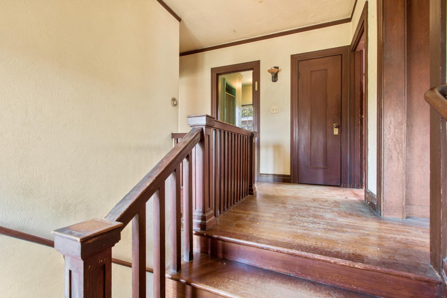 585 Santa Rosa Avenue Berkeley, CA 94707 - Photo 31 of 71 a view of a hallway with wooden floor and entryway