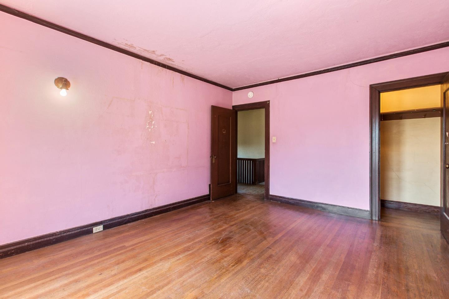 585 Santa Rosa Avenue Berkeley, CA 94707 - Photo 41 of 71 a view of a room with wooden floor