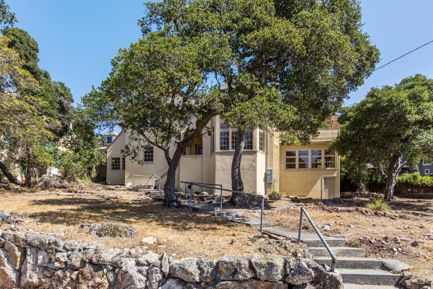 585 Santa Rosa Avenue Berkeley, CA 94707 - Photo 7 of 71 a view of a house with snow on the road