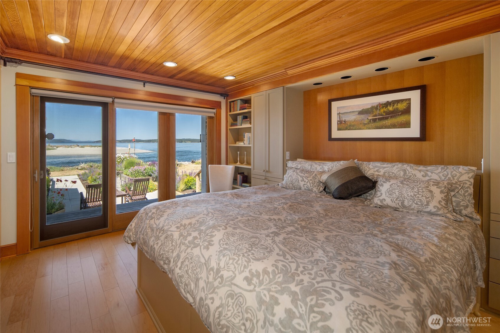 170 Weeks Point Way Lopez Island, WA 98261 - Photo 14 of 36 a bed sitting in a spacious bedroom next to a window