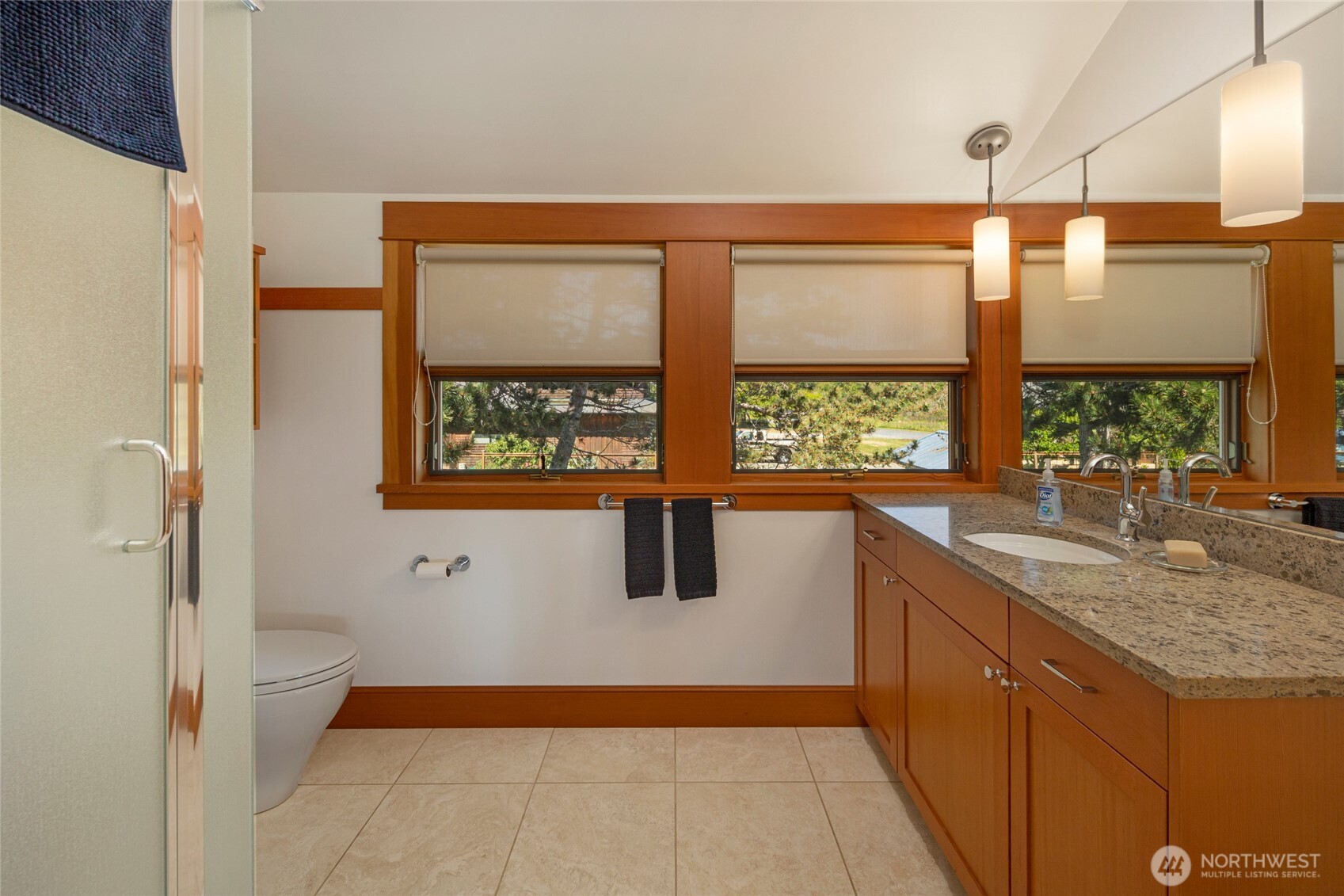 170 Weeks Point Way Lopez Island, WA 98261 - Photo 33 of 36 a kitchen with stainless steel appliances granite countertop a refrigerator and a sink