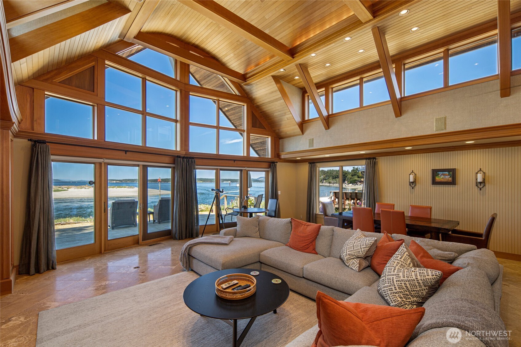 170 Weeks Point Way Lopez Island, WA 98261 - Photo 7 of 36 a living room with furniture and a floor to ceiling window