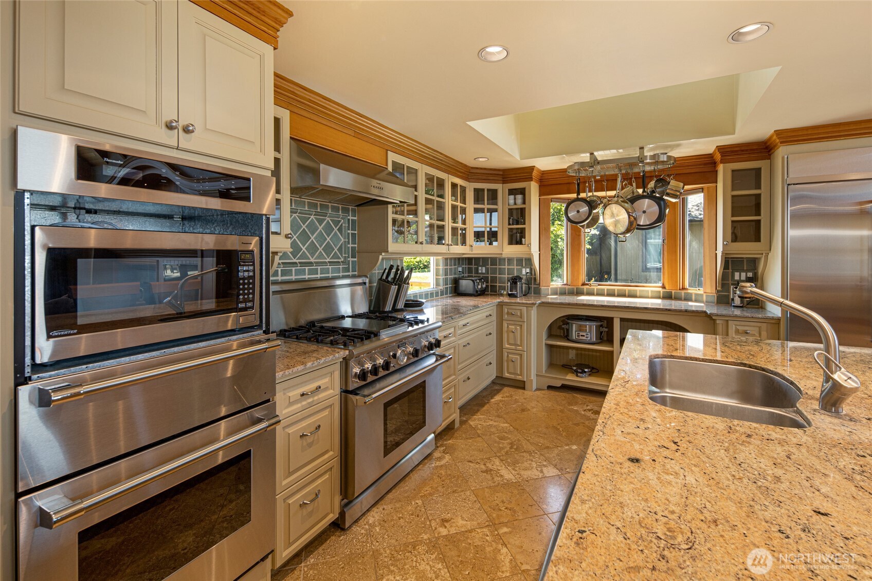 170 Weeks Point Way Lopez Island, WA 98261 - Photo 10 of 36 a kitchen with stainless steel appliances granite countertop a stove and a sink