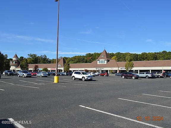 Undisclosed Address Roosevelt, NJ 08555 - Photo 17 of 20 a view of a city street with a car parked on the road