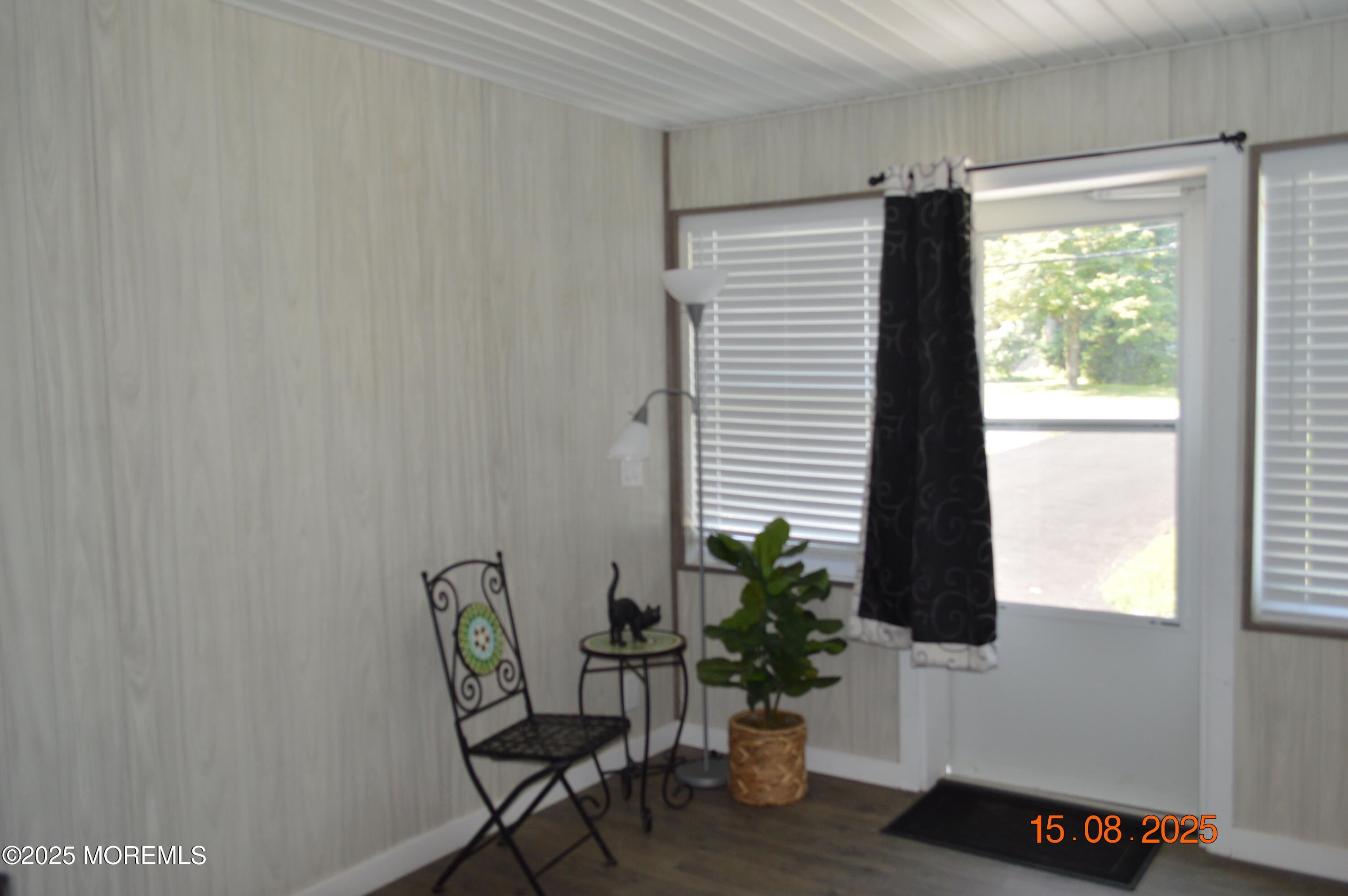 Undisclosed Address Roosevelt, NJ 08555 - Photo 20 of 20 a living room with furniture and a potted plant