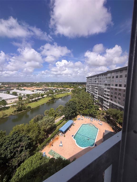 4001 Hillcrest Drive, Unit 1012 Hollywood, FL 33021 - Photo 12 of 14 a view of a lake from a balcony