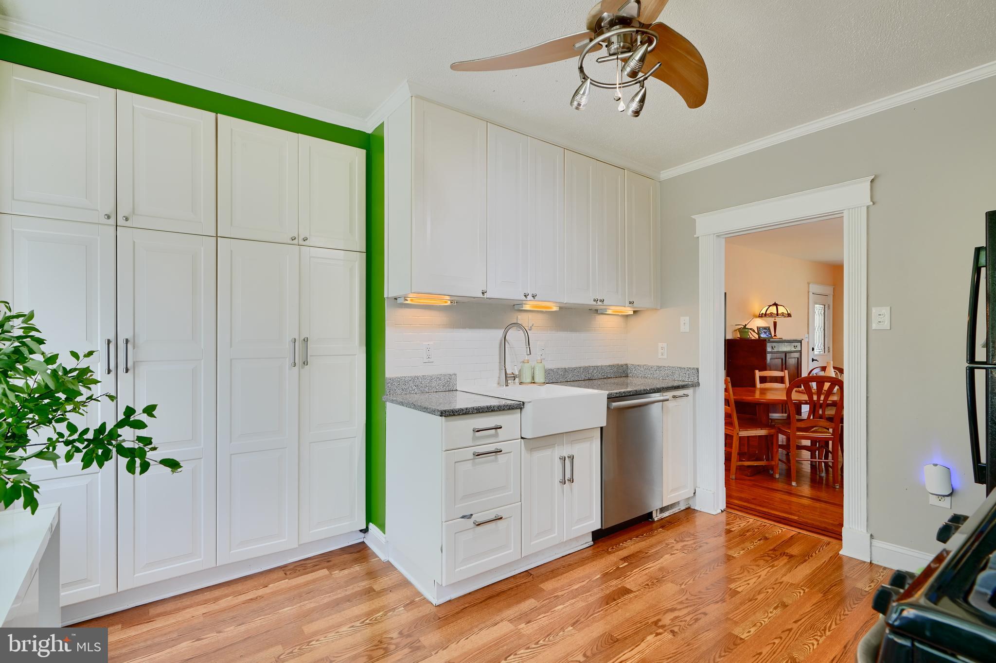 1111 Overbrook Road Baltimore, MD 21239 - Photo 14 of 47 a kitchen with stainless steel appliances granite countertop a stove a sink and a refrigerator