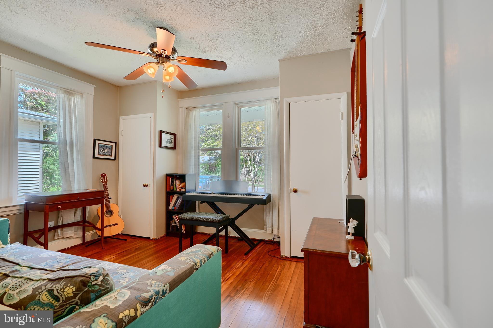 1111 Overbrook Road Baltimore, MD 21239 - Photo 15 of 47 a living room with furniture and a window