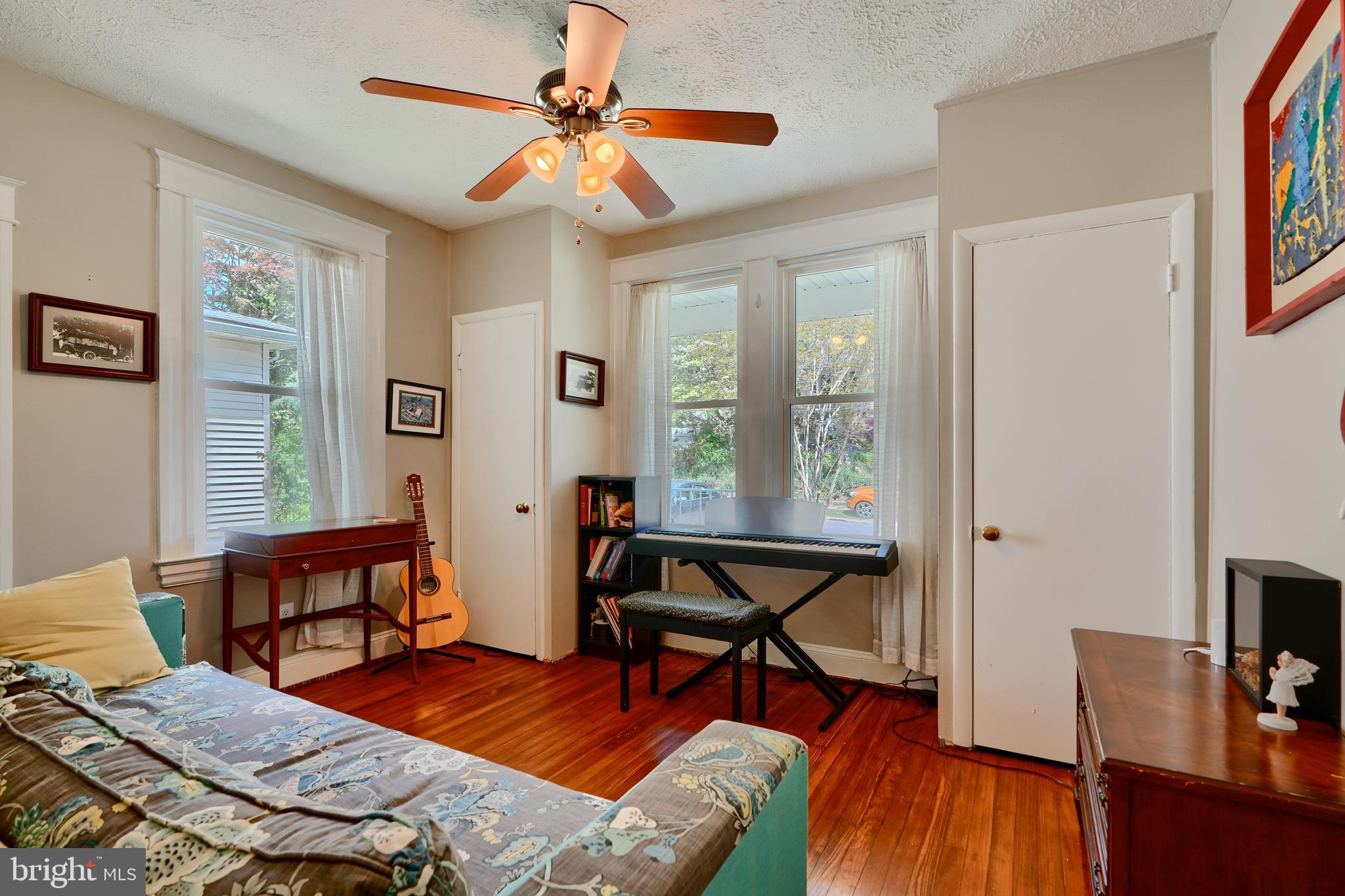 1111 Overbrook Road Baltimore, MD 21239 - Photo 16 of 47 a living room with furniture and wooden floor
