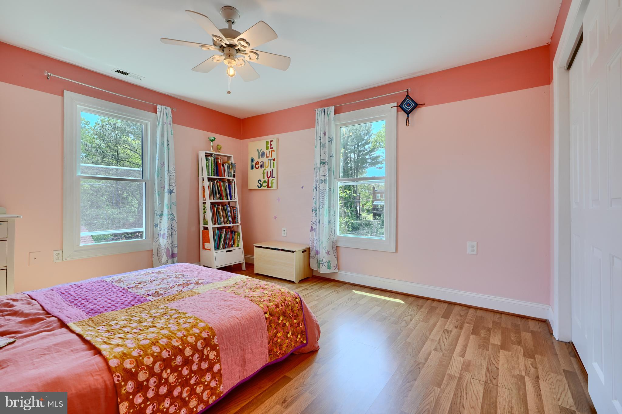 1111 Overbrook Road Baltimore, MD 21239 - Photo 27 of 47 a bedroom with a bed and a window