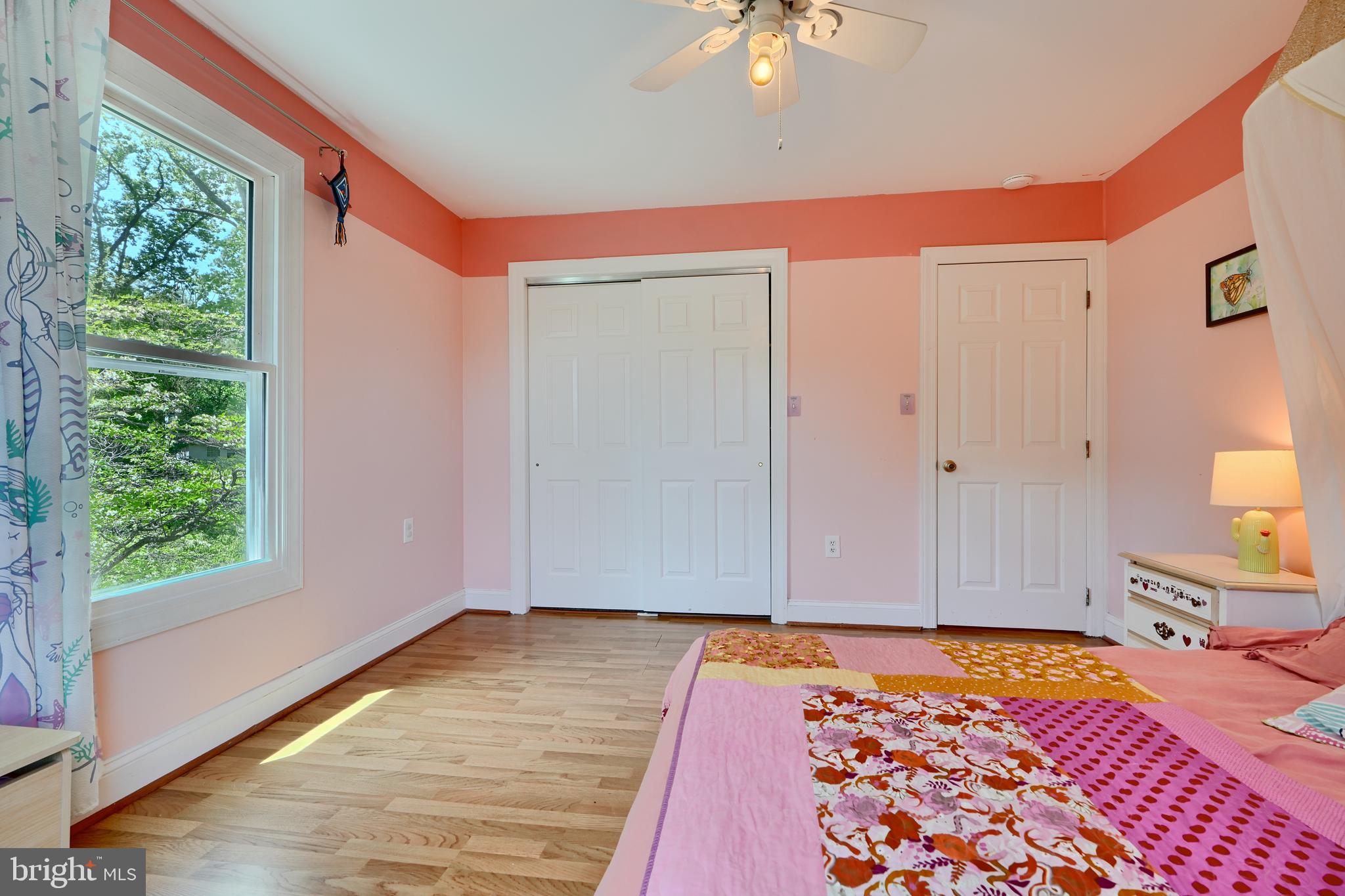 1111 Overbrook Road Baltimore, MD 21239 - Photo 28 of 47 a bedroom with a bed and a window