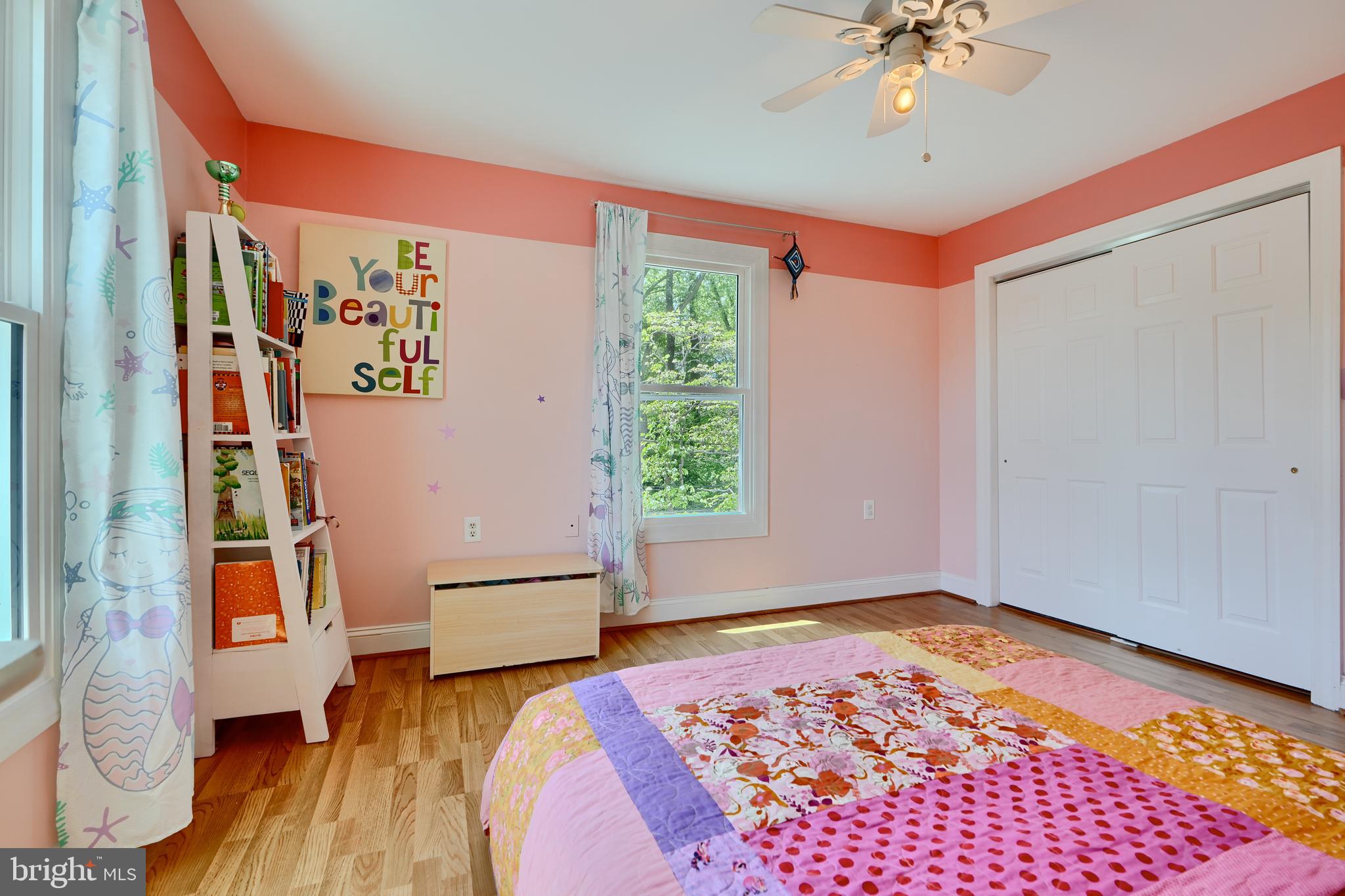 1111 Overbrook Road Baltimore, MD 21239 - Photo 29 of 47 a bedroom with a bed and a window