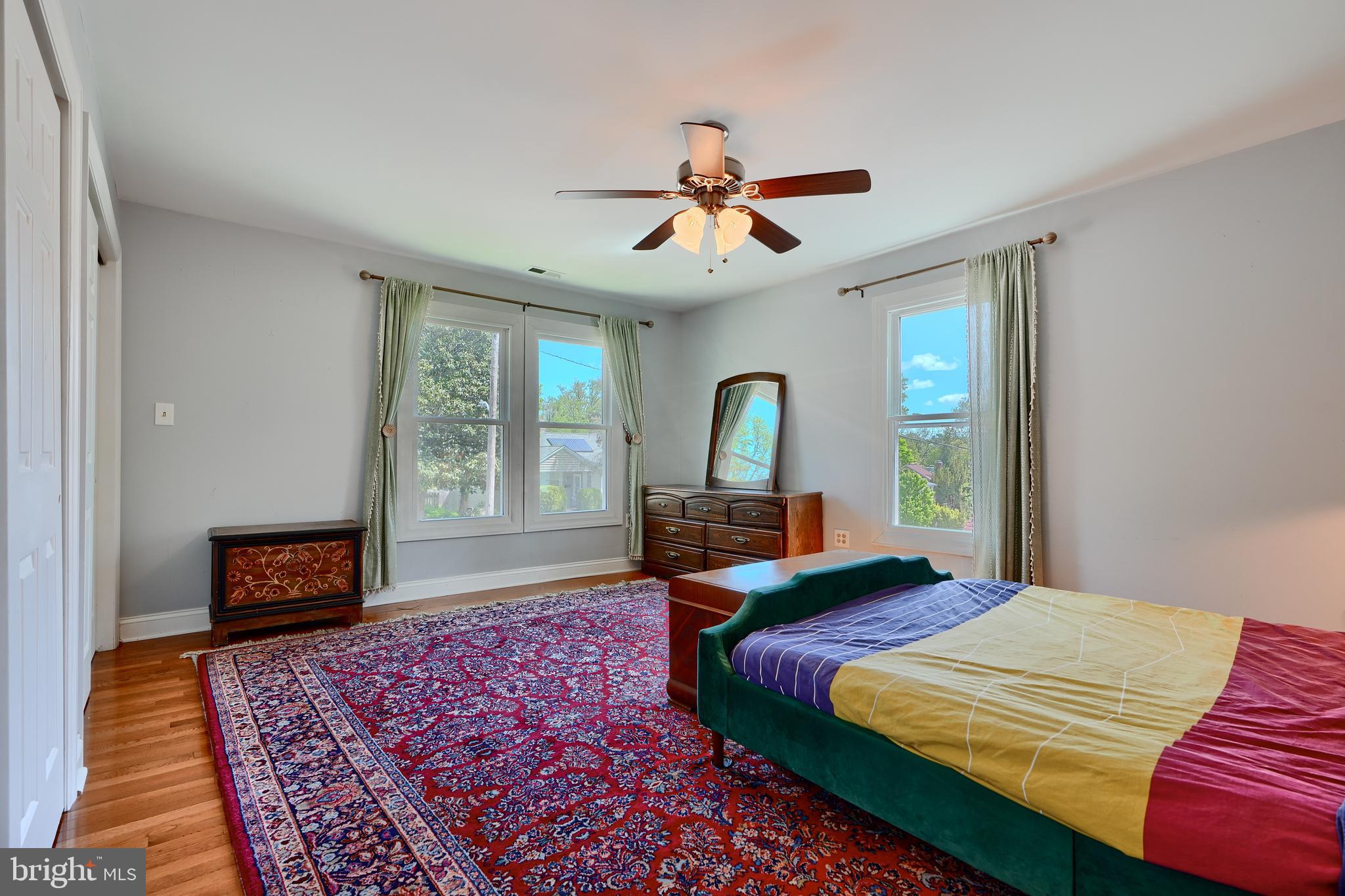 1111 Overbrook Road Baltimore, MD 21239 - Photo 30 of 47 a bedroom with a large bed and a window