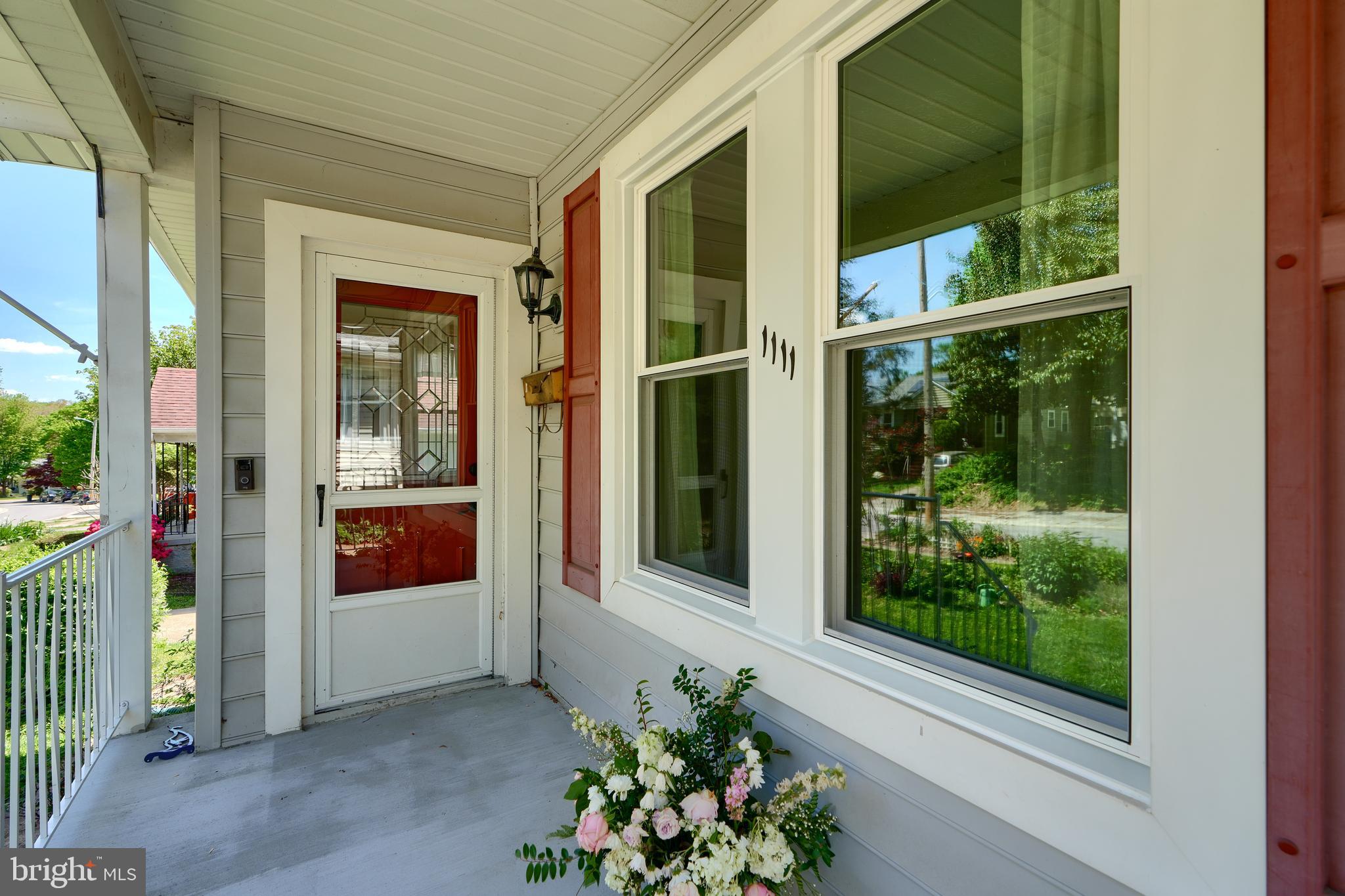 1111 Overbrook Road Baltimore, MD 21239 - Photo 3 of 47 a view of a door front of house