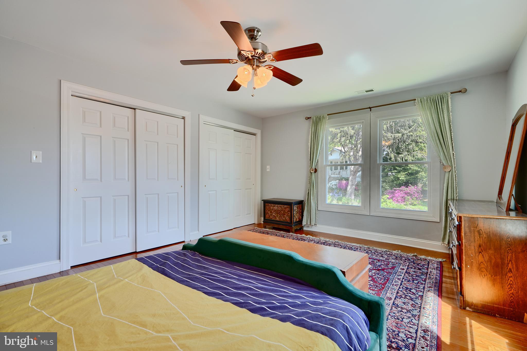 1111 Overbrook Road Baltimore, MD 21239 - Photo 31 of 47 a bedroom with a large bed and a window