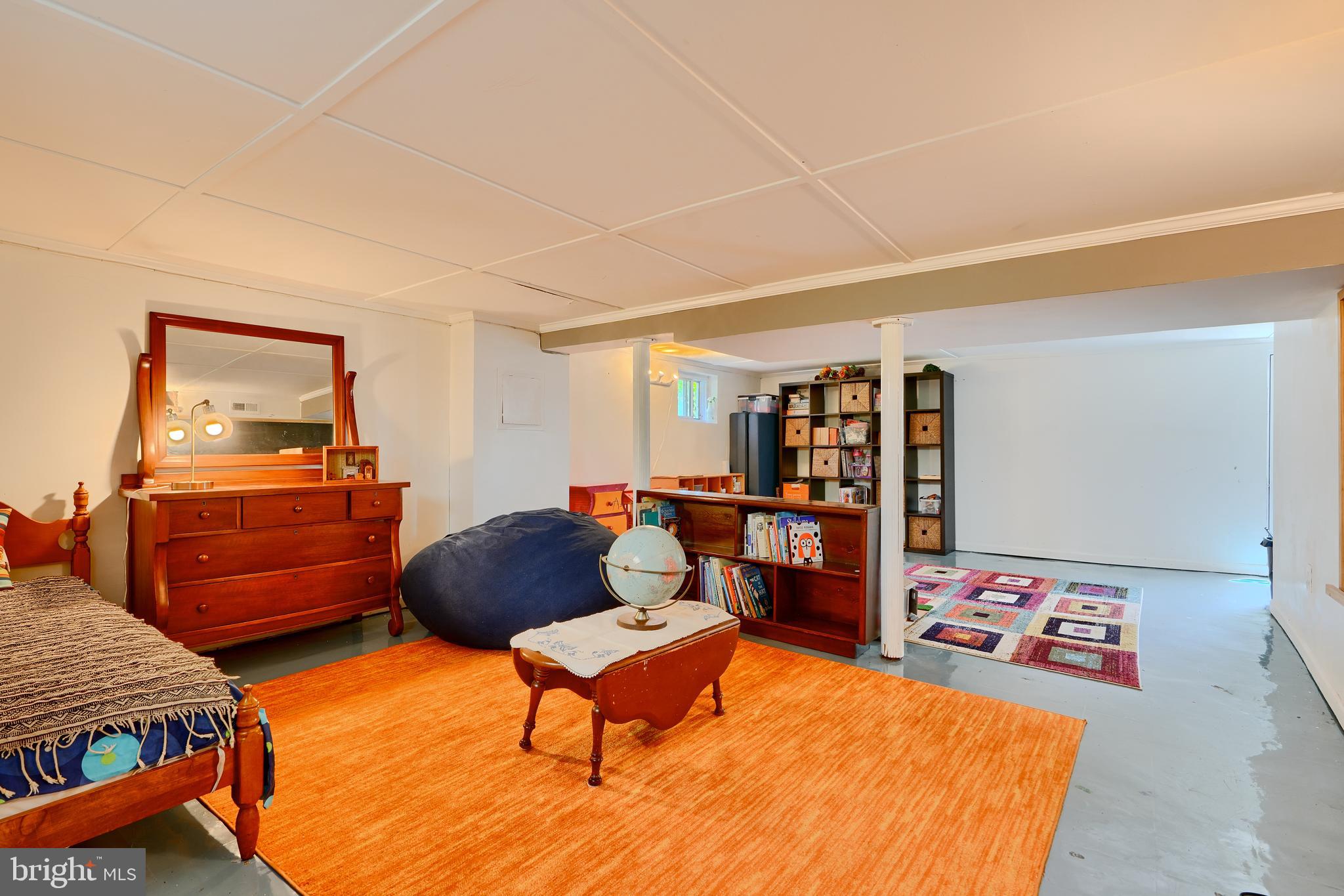 1111 Overbrook Road Baltimore, MD 21239 - Photo 37 of 47 a bedroom with furniture and a dresser