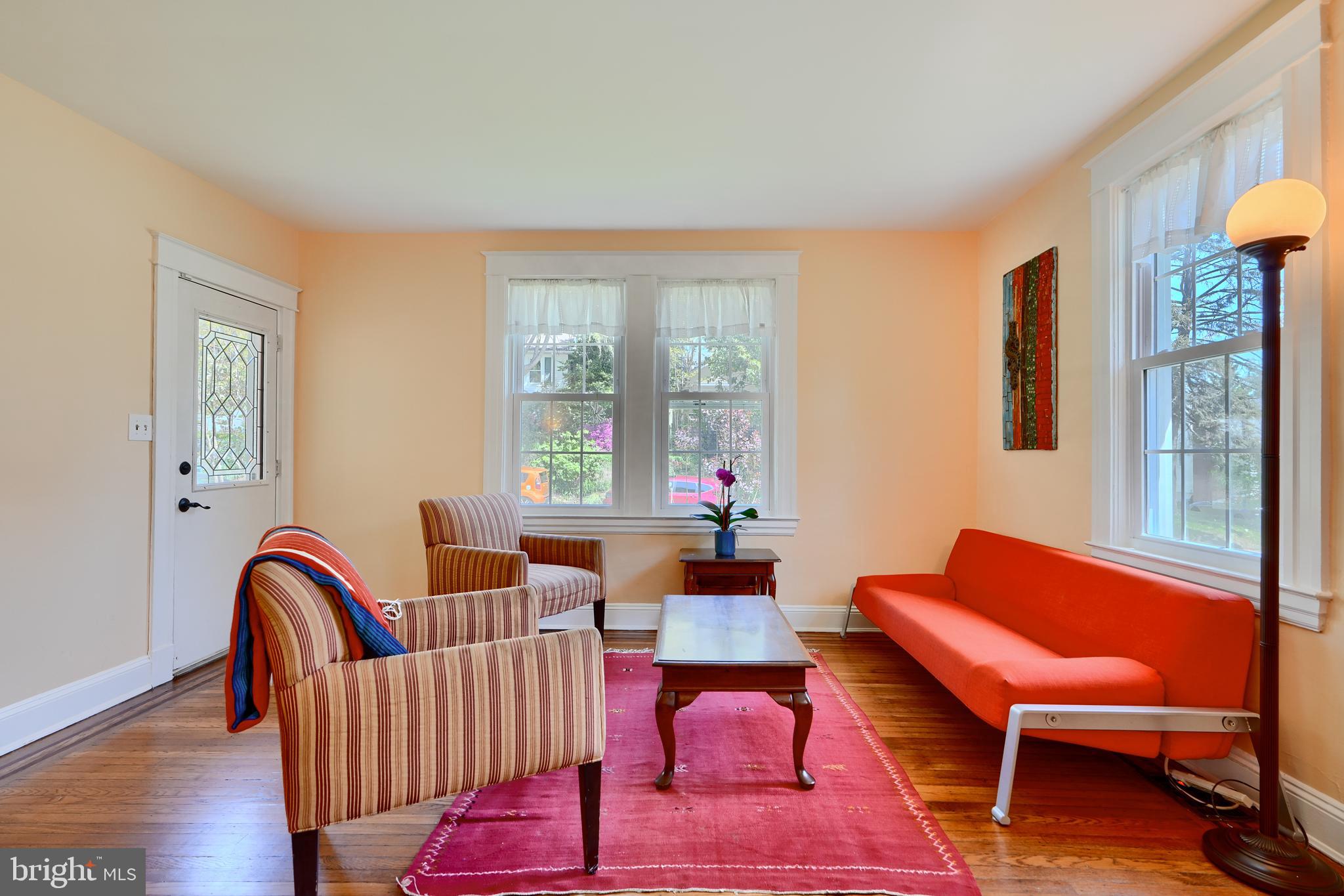 1111 Overbrook Road Baltimore, MD 21239 - Photo 6 of 47 a living room with furniture a rug and a window