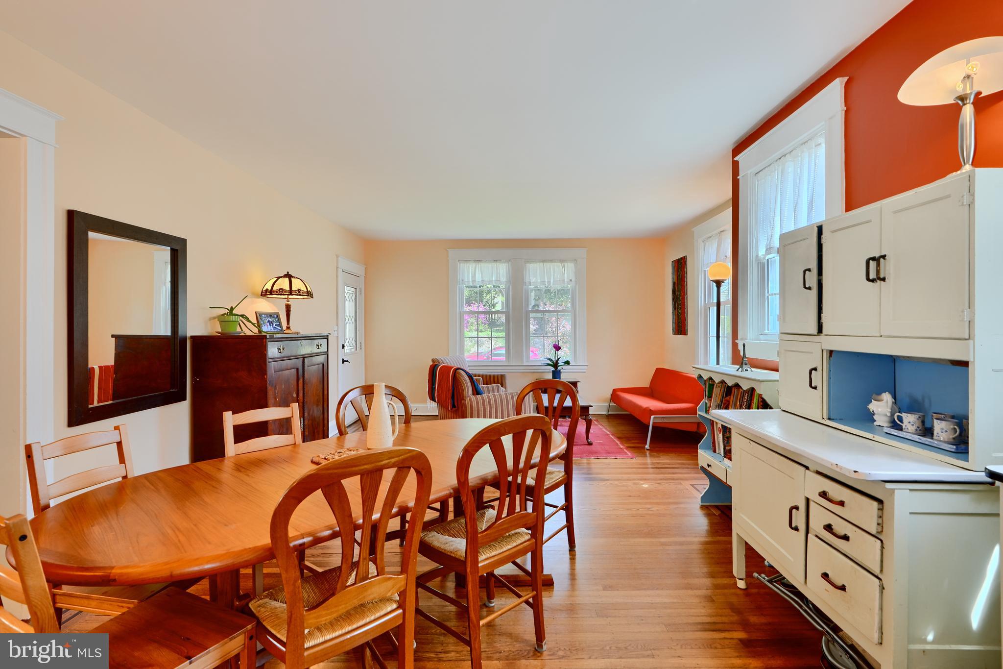 1111 Overbrook Road Baltimore, MD 21239 - Photo 8 of 47 a view of a dining room with furniture and wooden floor